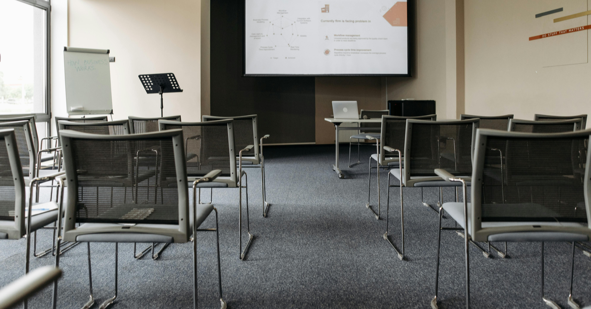 Modern classroom with a projector screen