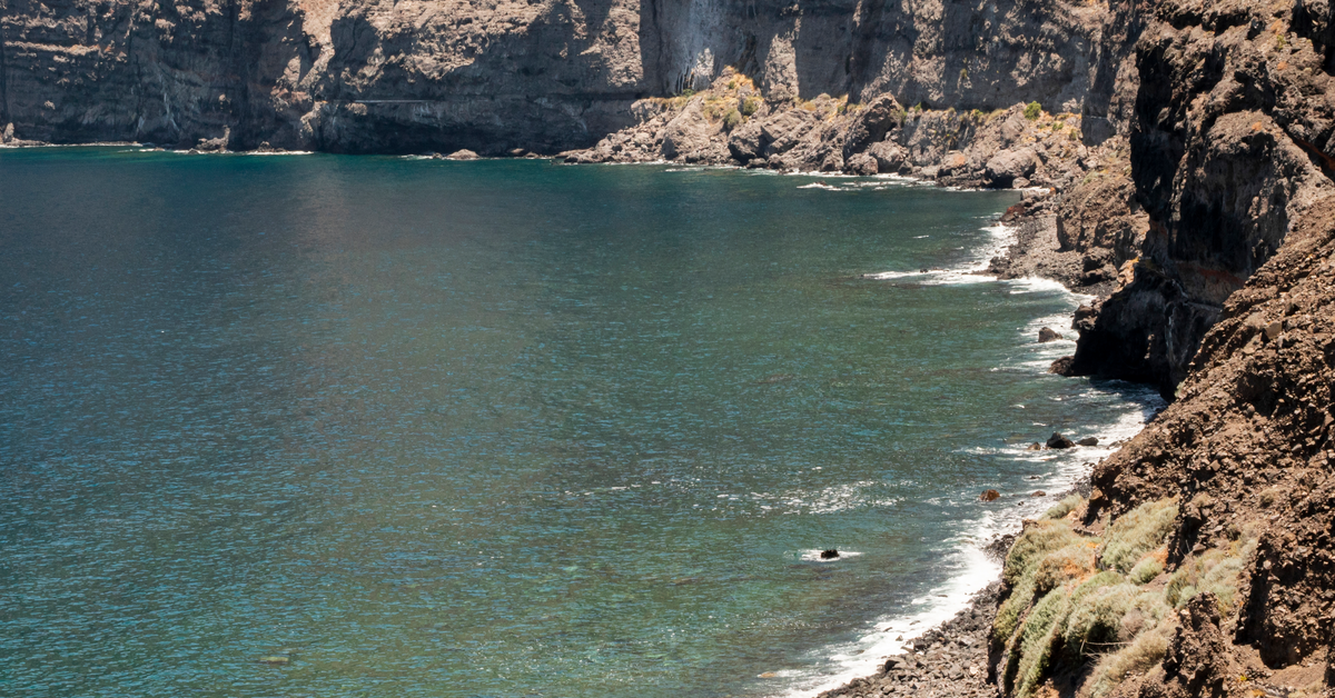 Mountain surrounded by water in Khor Fakkan