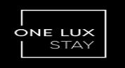 ONE LUX STAY HOLIDAY HOMES logo image