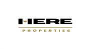 HERE PROPERTIES L.L.C logo image