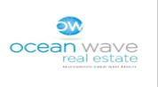 Ocean Wave Real Estate logo image Ocean Wave Real Estate logo image