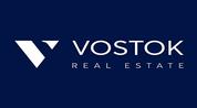 Vostok Real Estate developer Logo