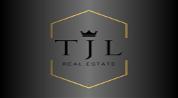 T J L REAL ESTATE L.L.C logo image T J L REAL ESTATE L.L.C logo image