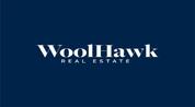 WOOLHAWK REAL ESTATE L.L.C logo image