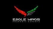 EAGLE WINGS REAL ESTATE BROKERS logo image EAGLE WINGS REAL ESTATE BROKERS logo image