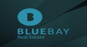 Blue Bay Real Estate logo image Blue Bay Real Estate logo image