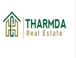 THARMDA REAL ESTATE