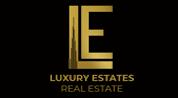 LUXURY ESTATES Real Estate logo image