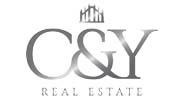 C E Y Real Estate logo image
