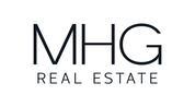 M H G REAL ESTATE L.L.C logo image