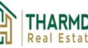 THARMDA REAL ESTATE logo image