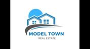 Model Town Real Estate & General Maintenance LLC logo image