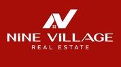 NINE VILLAGE REAL ESTATE L.L.C logo image