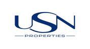 U S N PROPERTIES logo image