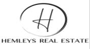 HEMLEYS REAL ESTATE L.L.C logo image