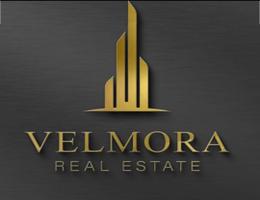 VELMORA REAL ESTATE L.L.C
