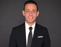 Agent Andrew Guirguis