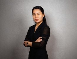 Agent Elina Tilekova