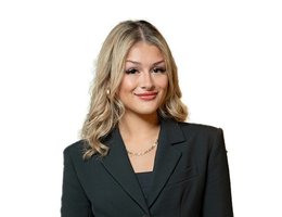 Agent Olivia Maria Deni