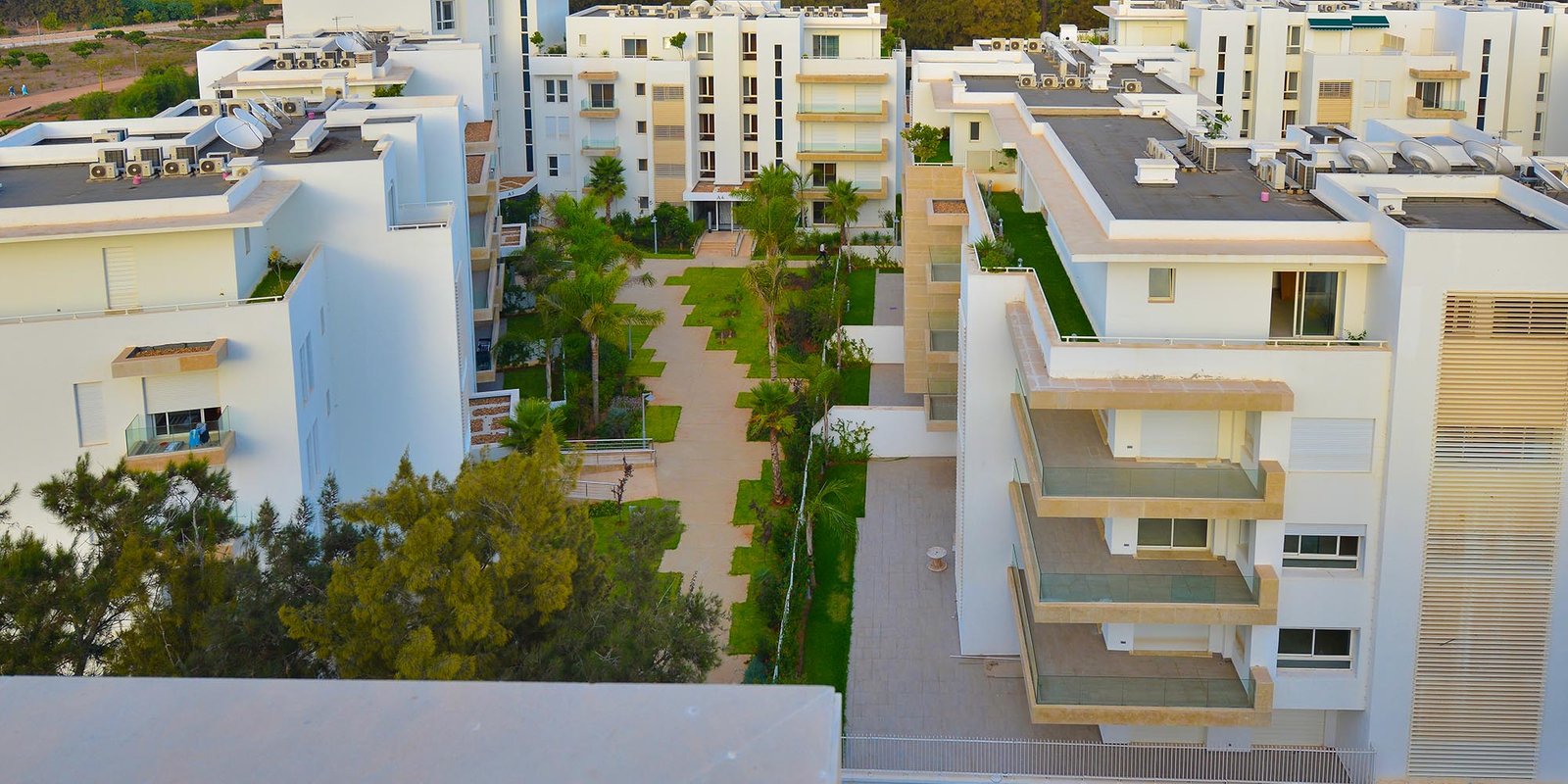 Place des Zaers par Akwa Immo Dévloppment dans Rabat - Hero Image