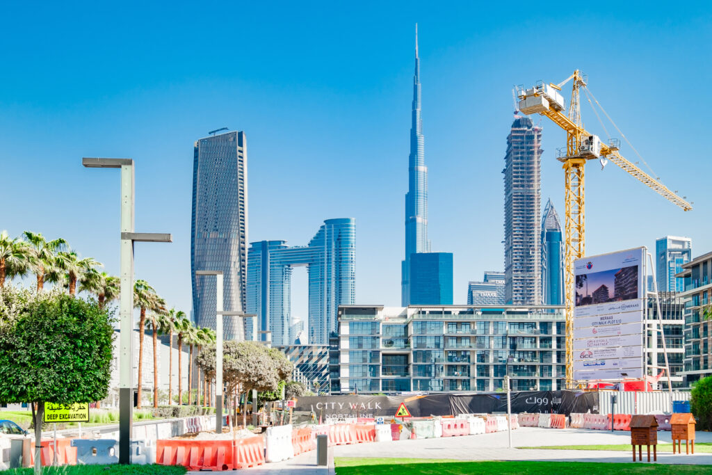Dubai skyline with active off-plan construction near City Walk and Burj Khalifa, highlighting future real estate investment opportunities and new developments