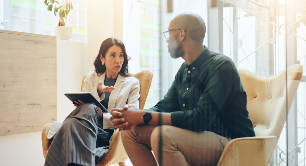 One-to-one coaching session between a real estate agency leader and broker, bridging coaching leadership and vision-first strategy for a Dubai brokerage.