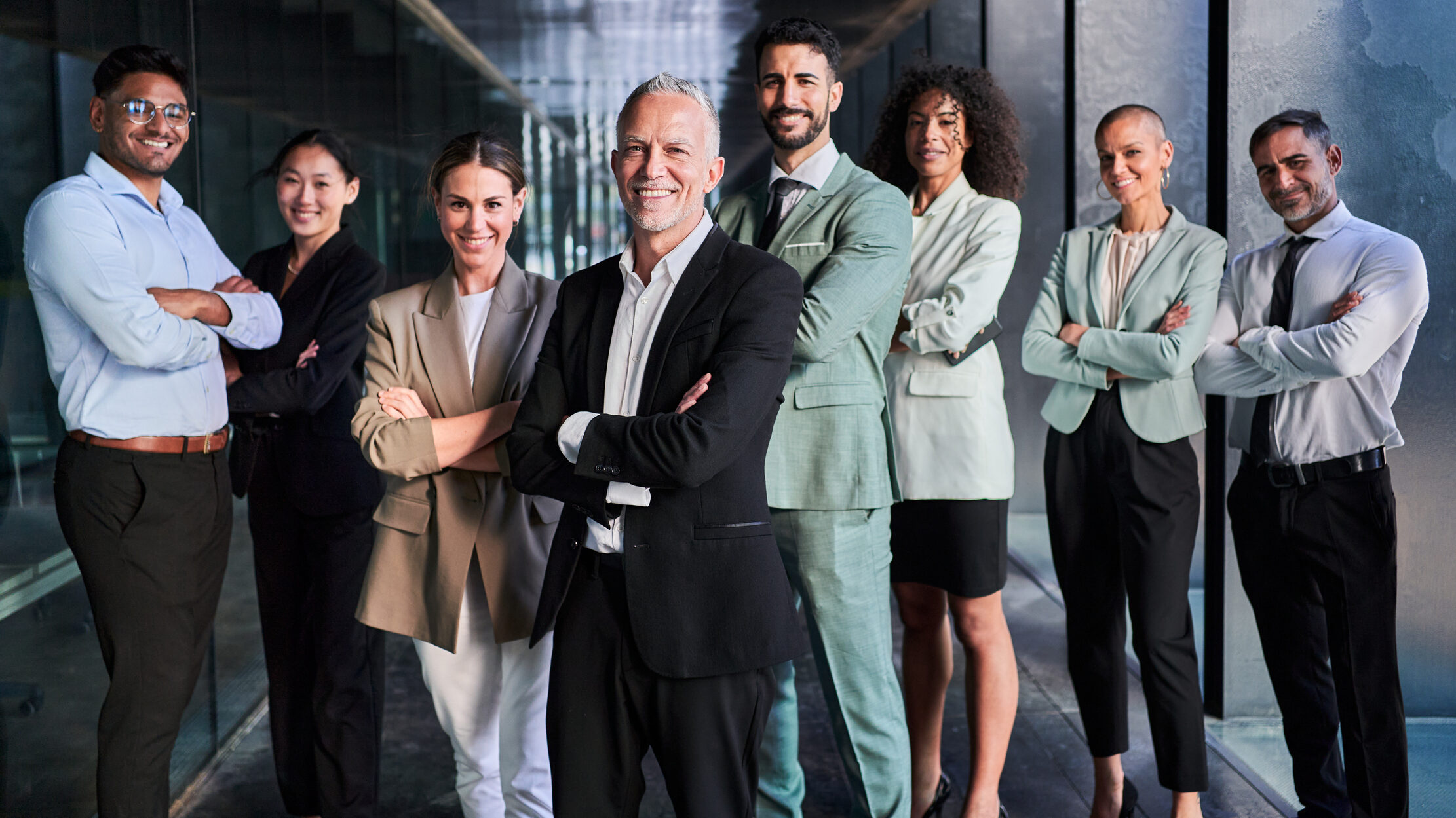 Confident Dubai real estate agent team in a modern office, representing top UAE agents who plan their week for consistent productivity, follow-ups, and results