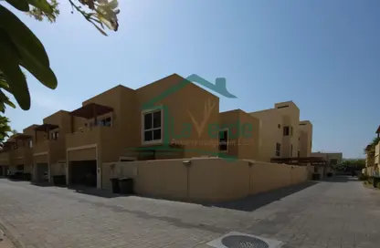 Outdoor Building image for: Townhouse - 4 Bedrooms - 5 Bathrooms for sale in Khannour Community - Al Raha Gardens - Abu Dhabi, Image 1