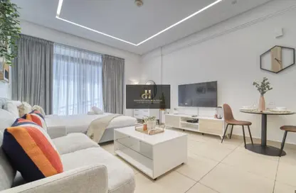 Living Room image for: Apartment - 1 Bathroom for sale in Sunrise Legend - Arjan - Dubai, Image 1
