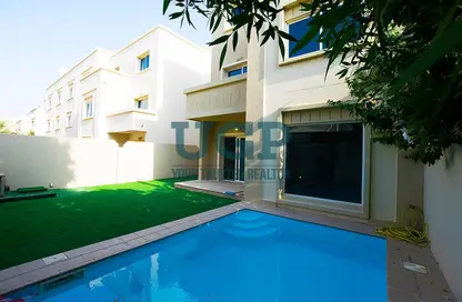 Pool image for: Villa - 5 Bedrooms - 6 Bathrooms for sale in Arabian Style - Al Reef Villas - Al Reef - Abu Dhabi, Image 1