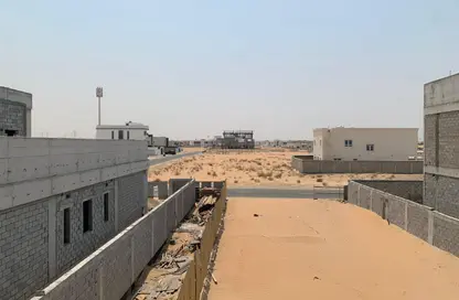 أرض - استوديو للبيع في روضة القرط - ضاحية الروضات - الشارقة