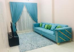 Living Room image for: Apartment - 1 bedroom - 2 bathrooms for rent in Emirates City - Ajman, Image 1
