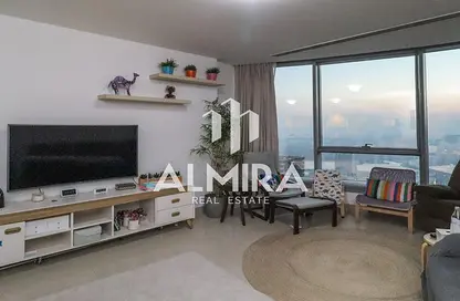 Living Room image for: Apartment - 2 Bedrooms - 2 Bathrooms for sale in Sun Tower - Shams Abu Dhabi - Al Reem Island - Abu Dhabi, Image 1