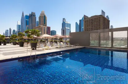 Pool image for: Apartment - 1 Bathroom for sale in Rove City Walk - City Walk - Dubai, Image 1
