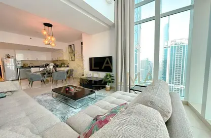 Living / Dining Room image for: Apartment - 1 Bedroom - 2 Bathrooms for sale in Laguna Tower - Lake Almas West - Jumeirah Lake Towers - Dubai, Image 1