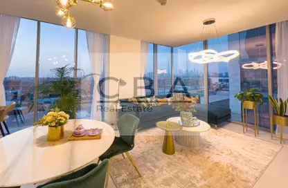 Living / Dining Room image for: Apartment - 1 Bedroom - 2 Bathrooms for sale in District One Phase III - District One - Mohammed Bin Rashid City - Dubai, Image 1