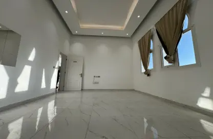 Empty Room image for: Apartment - 1 Bathroom for rent in Complex 14 - Khalifa City - Abu Dhabi, Image 1