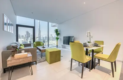 Living / Dining Room image for: Apartment - 2 Bedrooms - 2 Bathrooms for rent in Marquise Square Tower - Business Bay - Dubai, Image 1