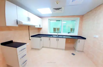 Kitchen image for: Apartment - 2 Bedrooms - 2 Bathrooms for rent in Al Telal Building - Al Majaz 2 - Al Majaz - Sharjah, Image 1