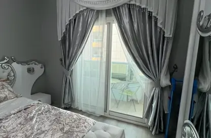 Apartment - 1 Bedroom - 2 Bathrooms for sale in Orient Towers - Al Bustan - Ajman