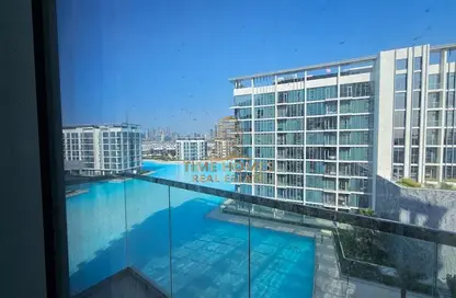 صورة لـ حوض سباحة شقة - 2 غرف نوم - 3 حمامات للايجار في مساكن 14 - المنطقة وان - مدينة الشيخ محمد بن راشد - دبي ، صورة رقم 1