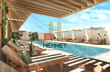 Pool image for: Apartment - 1 Bathroom for sale in Luma 22 - Jumeirah Village Circle - Dubai, Image 1
