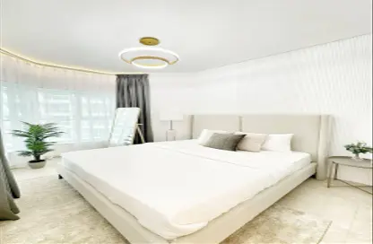 صورة لـ غرفة- غرفة النوم شقة - 1 حمام للايجار في بوابة دبي الجديدة 2 - بحيرة إلوشيو - أبراج بحيرة الجميرا - دبي ، صورة رقم 1
