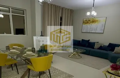 Living / Dining Room image for: Apartment - 2 Bedrooms - 1 Bathroom for sale in Al Yasmeen 1 - Al Yasmeen - Ajman, Image 1