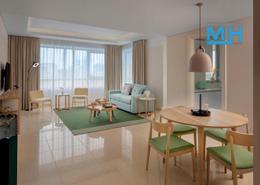 Living / Dining Room image for: Apartment - 1 bedroom - 2 bathrooms for rent in Staybridge Suites - Dubai Media City - Dubai, Image 1