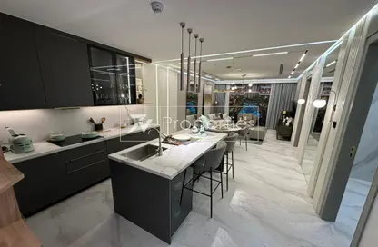 صورة لـ مطبخ شقة - 2 غرف نوم - 3 حمامات للبيع في 48 باركسايد - ارجان - دبي ، صورة رقم 1