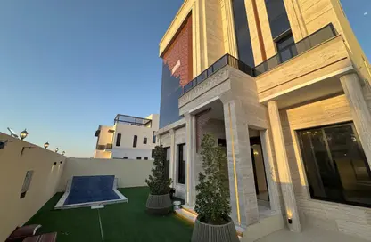 Villa - 6 Bedrooms - 7 Bathrooms for sale in Ajman Global City - Al Alia - Ajman