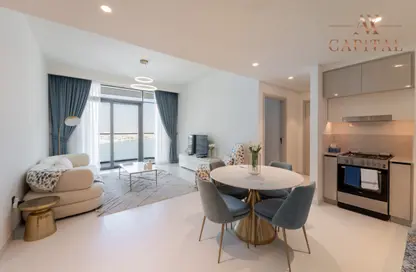 Living / Dining Room image for: Apartment - 1 Bedroom - 1 Bathroom for sale in Marina Vista - EMAAR Beachfront - Dubai Harbour - Dubai, Image 1