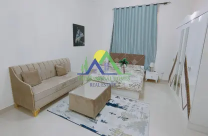 Living Room image for: Apartment - 1 Bathroom for rent in Asharej - Al Ain, Image 1