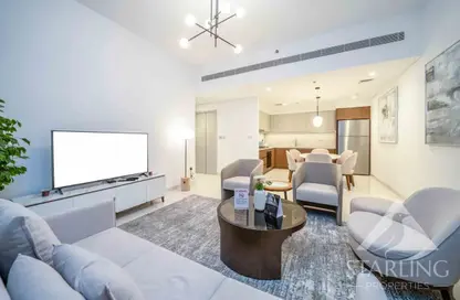Living Room image for: Apartment - 2 Bedrooms - 2 Bathrooms for sale in Beach Isle - EMAAR Beachfront - Dubai Harbour - Dubai, Image 1